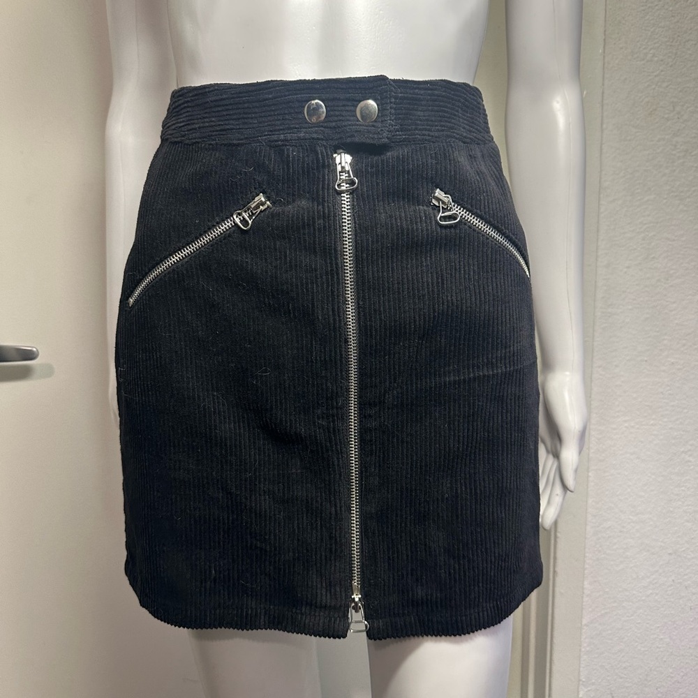 Corduroy black mini skirt with silver hardware